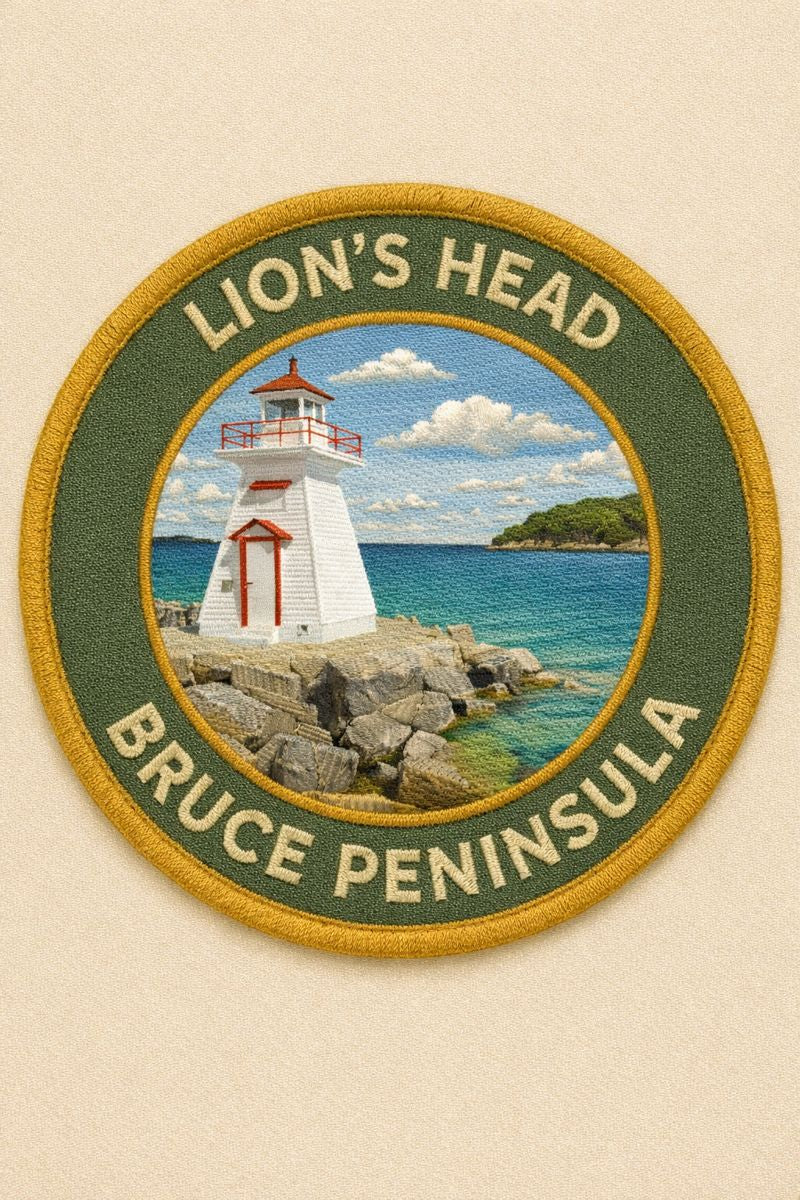 Patch with a lighthouse design and text 'Lion's Head Bruce Peninsula' on a beige background