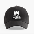 Black cap with 'Trail North' logo on a white background