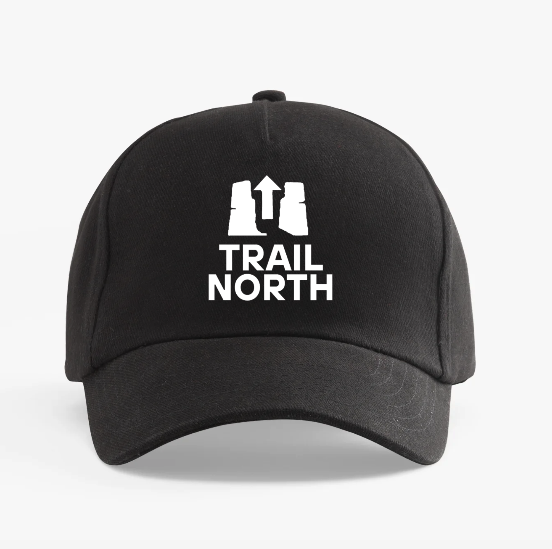 Black cap with 'Trail North' logo on a white background