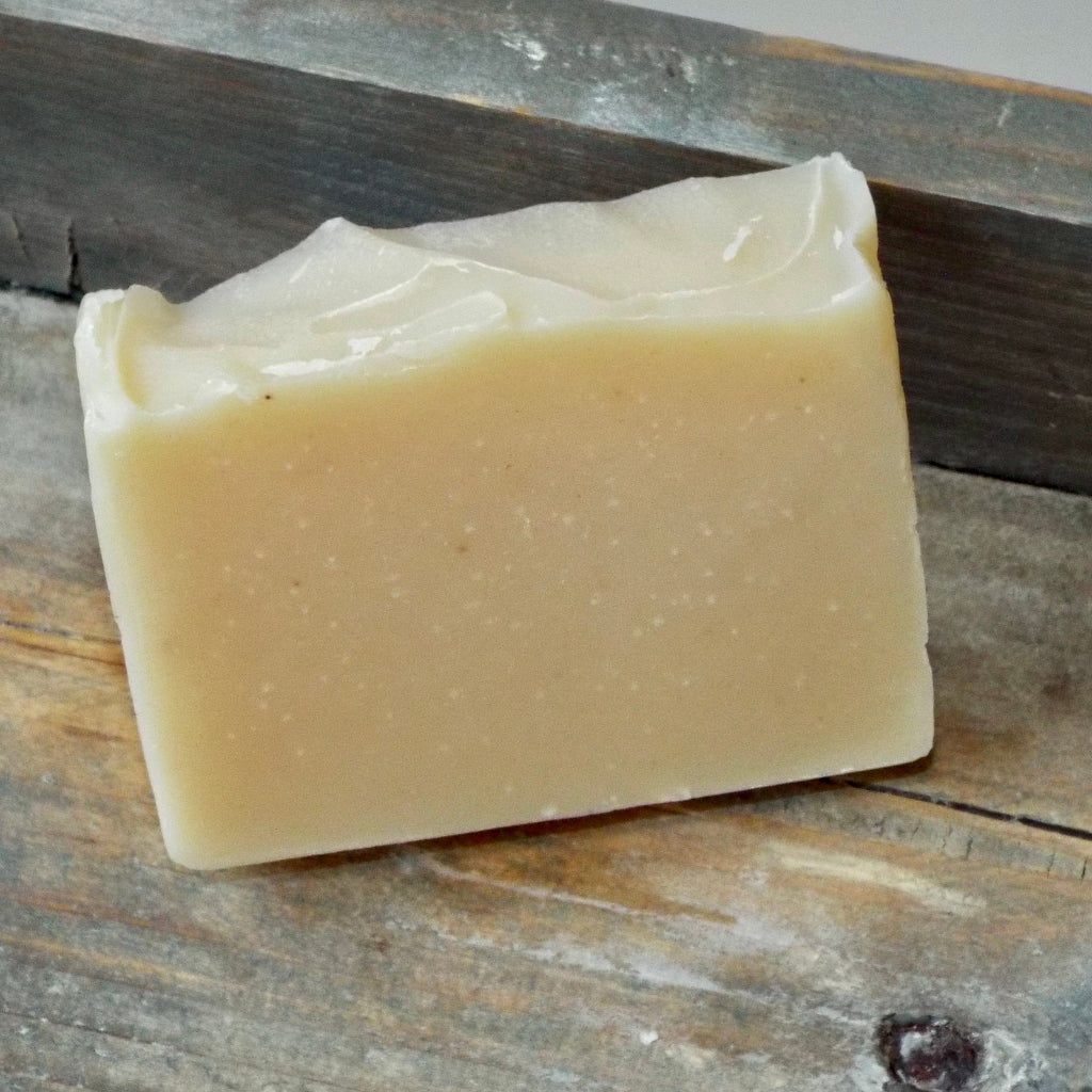 Bar of soap on a wooden surface